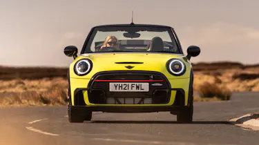 2021 MINI Convertible driving with roof down - front end