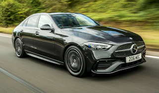Mercedes C-Class saloon driving