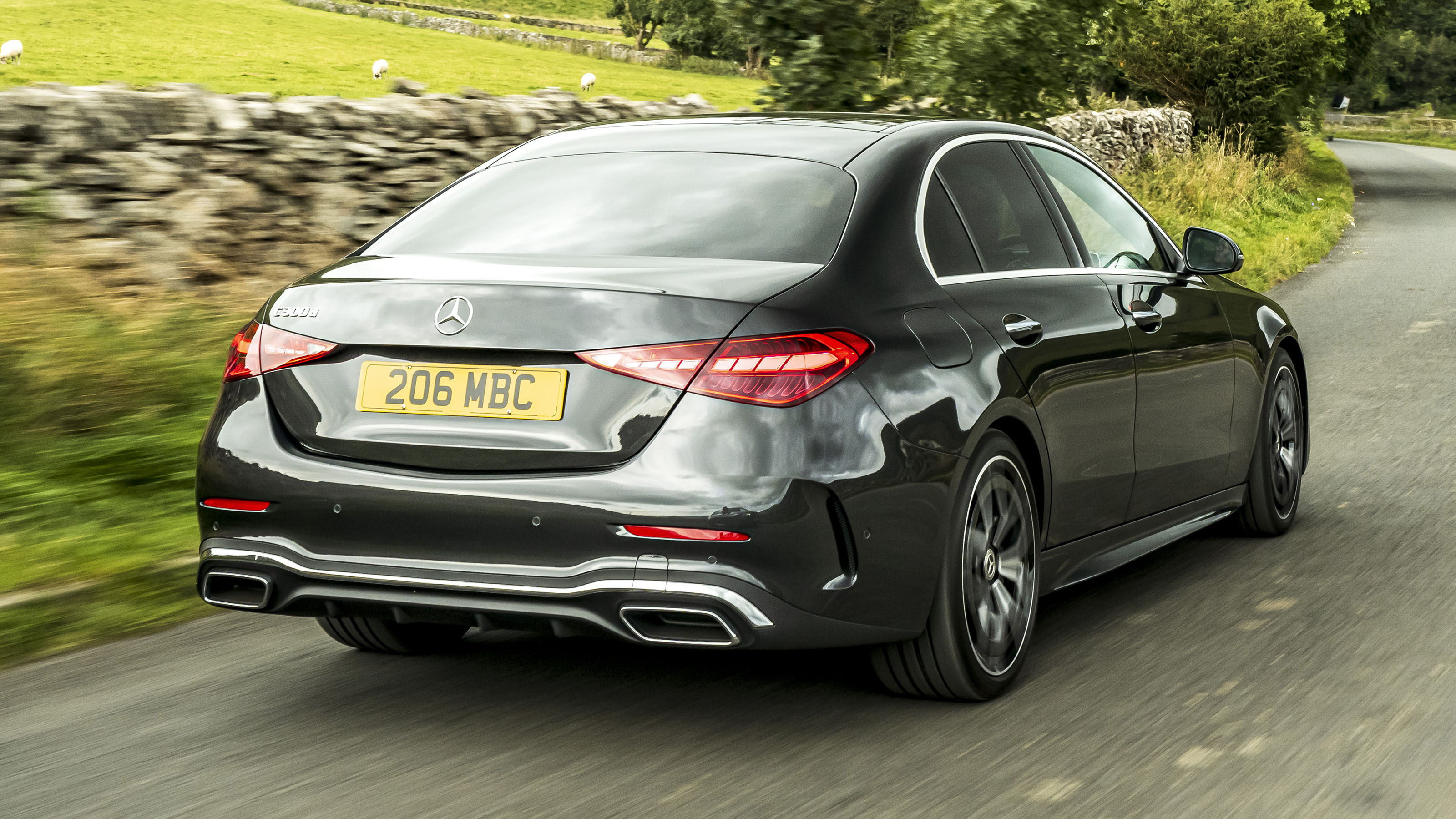 Mercedes C-Class saloon driving - rear