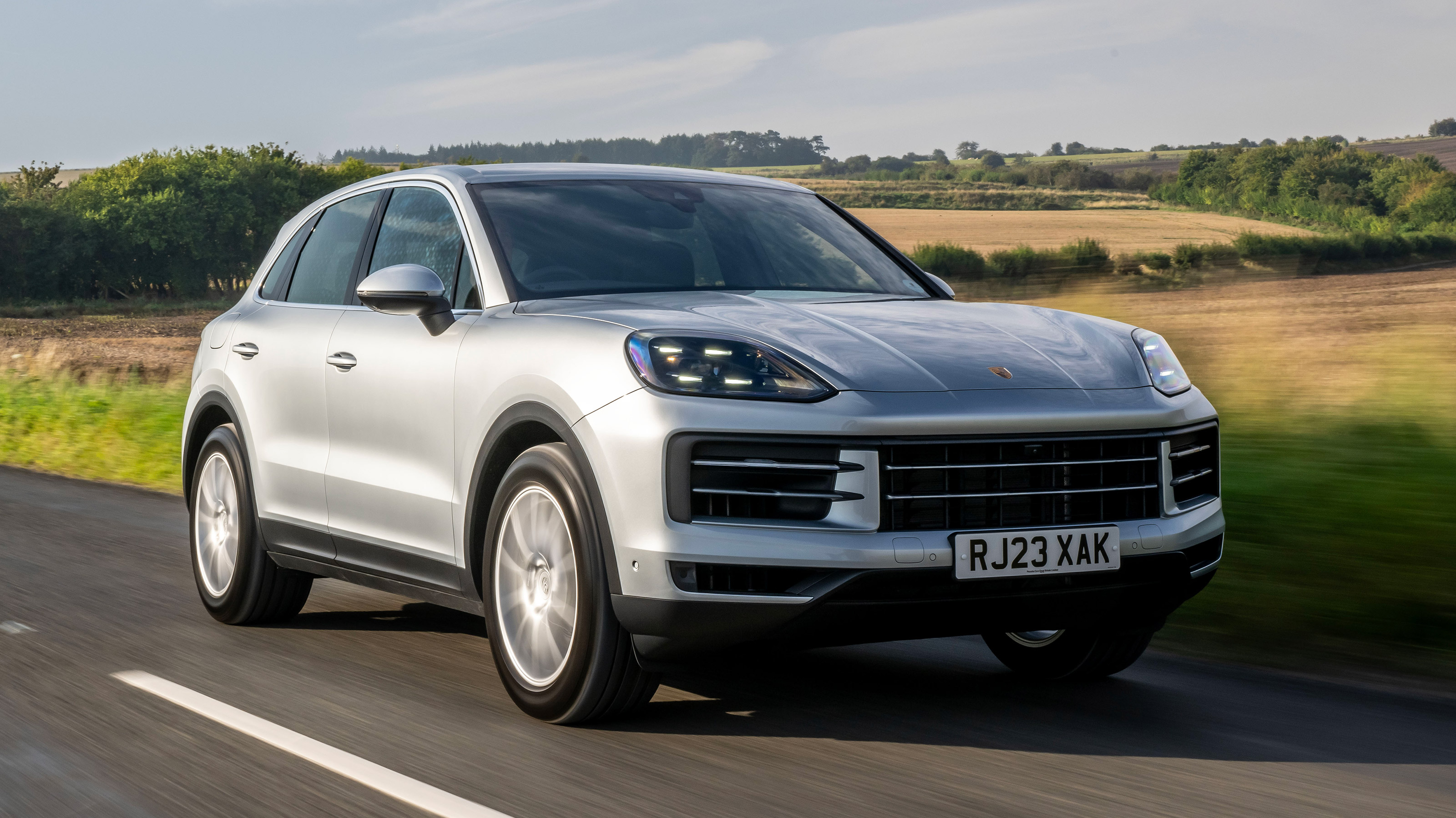 Porsche Cayenne SUV front 3/4 driving