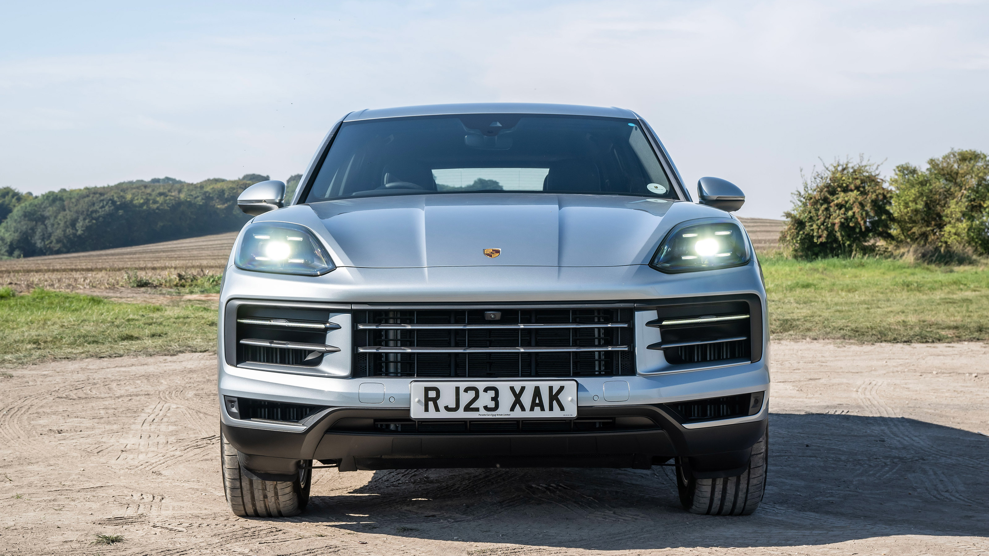 Porsche Cayenne SUV front static gravel