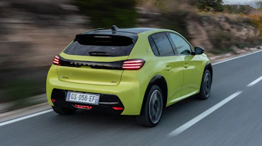Peugeot E-208 rear 3/4 tracking