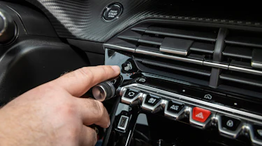 Peugeot E-208 controls staff