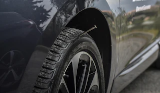 Tyre with nail stuck in the sidewall