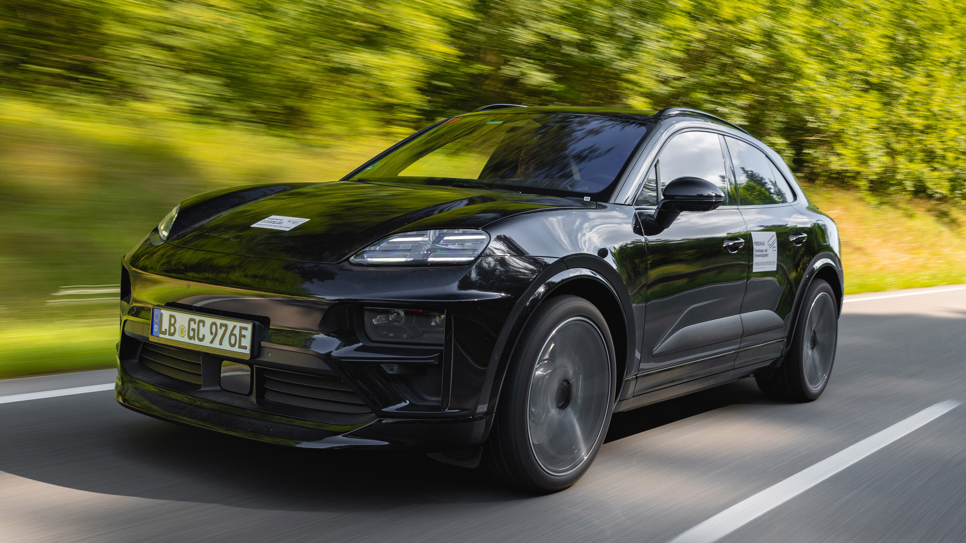 Porsche Macan EV dynamic front-quarter