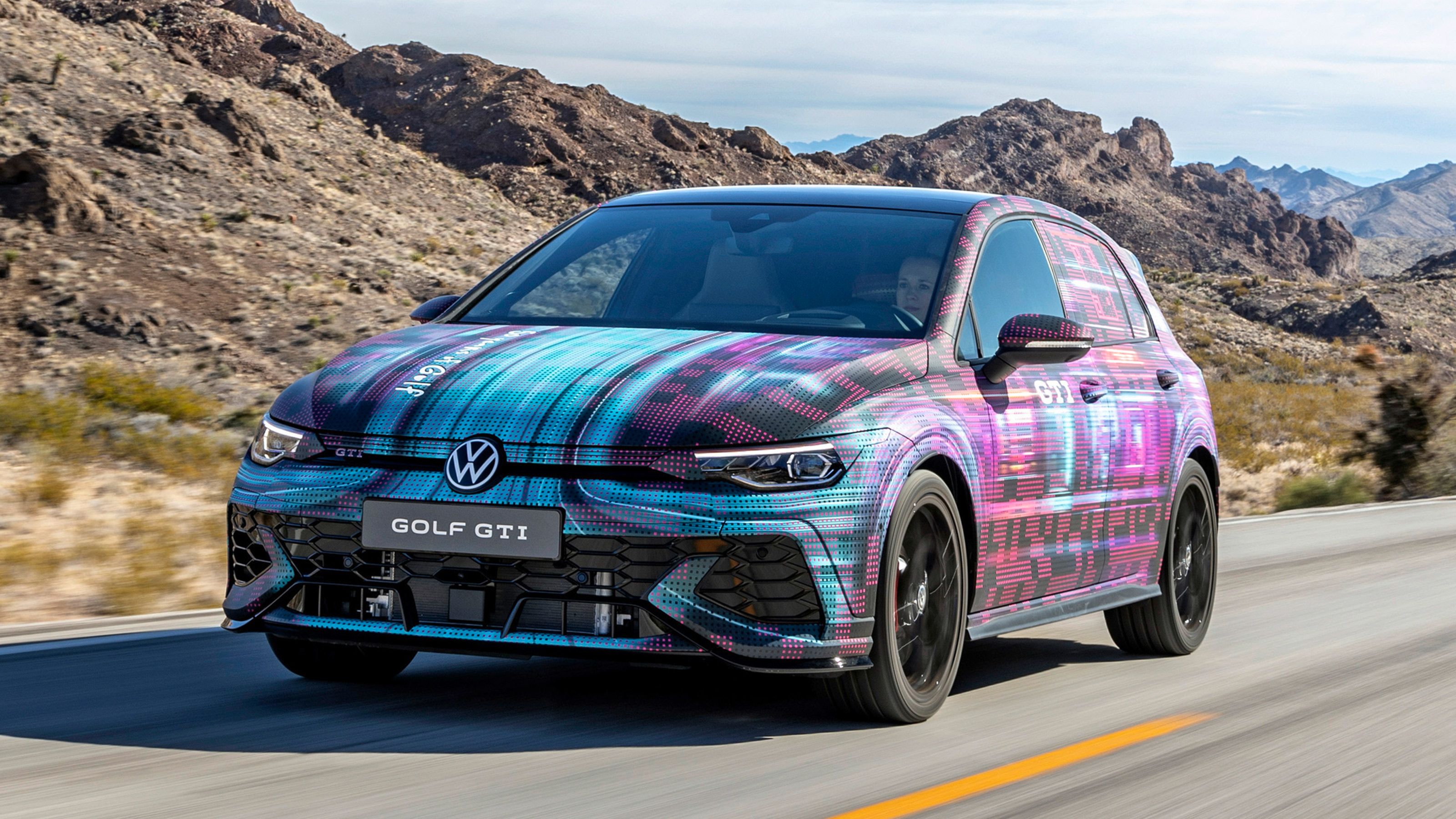 VW Golf GTI tracking front quarter