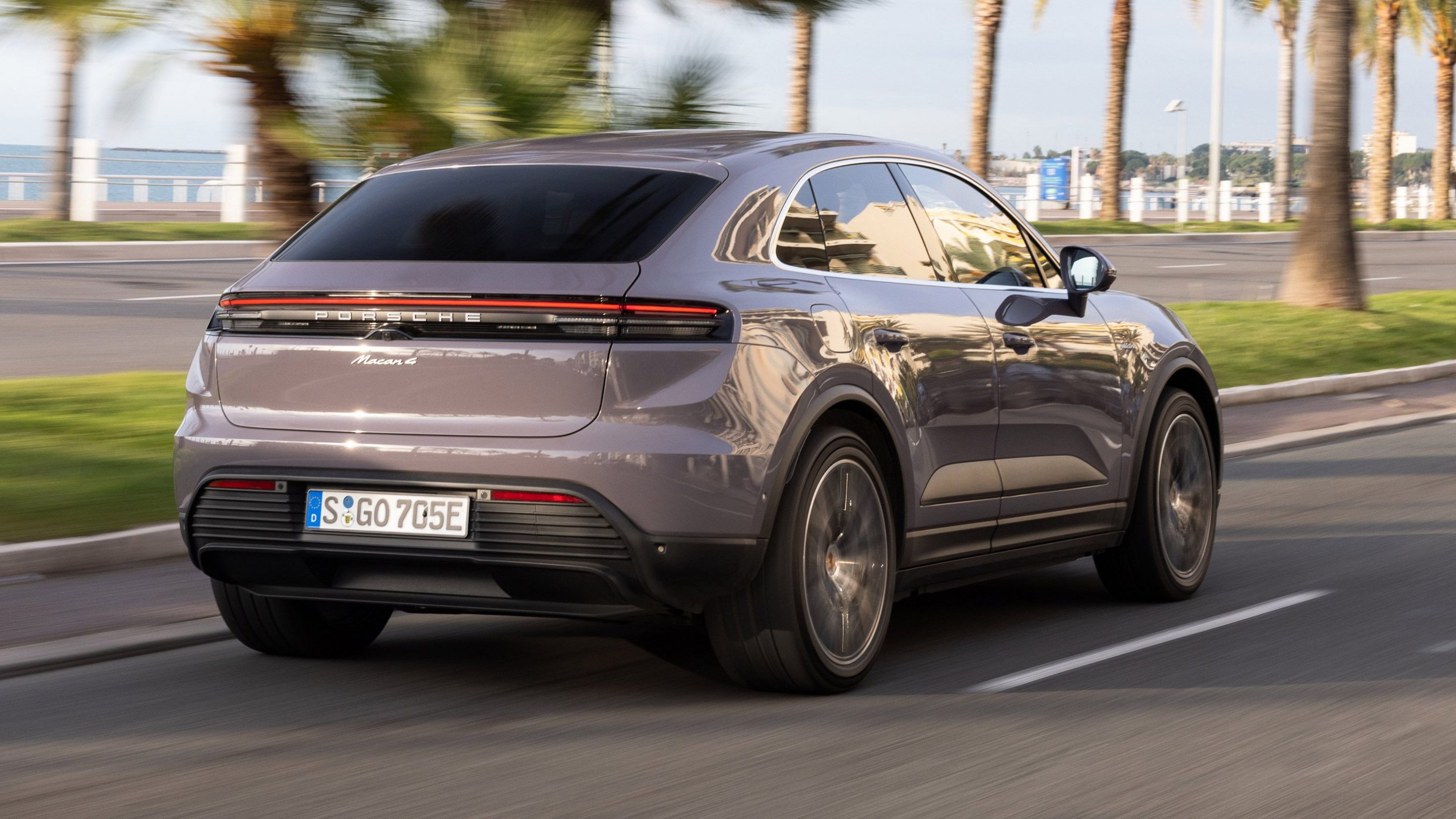 Porsche Macan Electric rear 3/4 tracking ocean