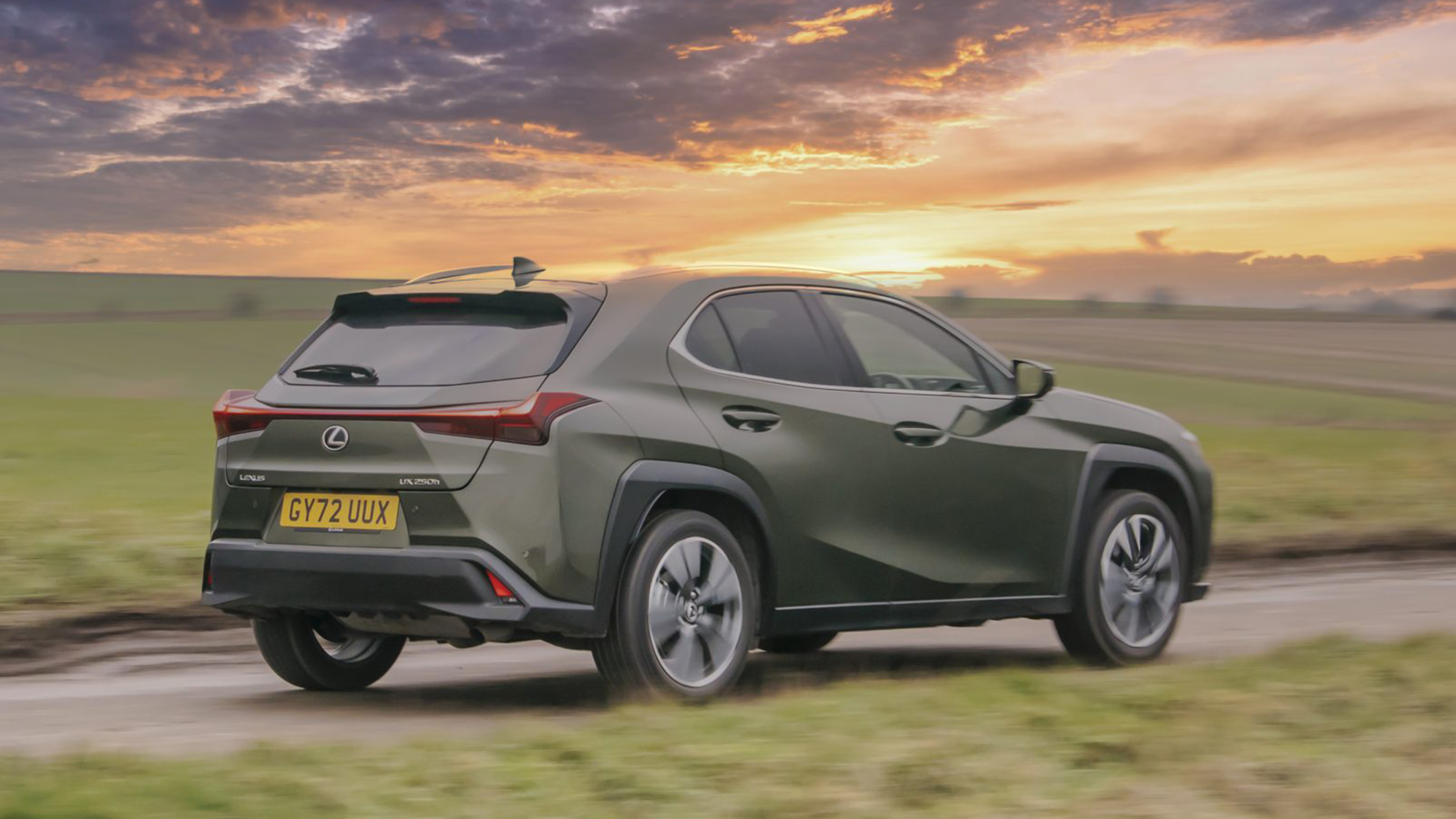 Lexus UX 2024 rear quarter dynamic 2