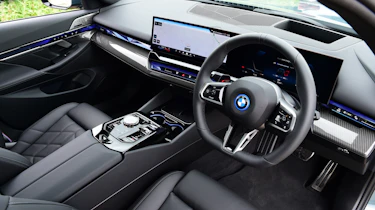 BMW i5 Touring interior side