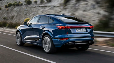 Audi Q6 Sportback e-tron driving rear quarter