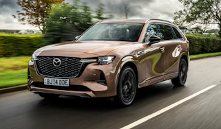 Mazda CX-80 front quarter cruising