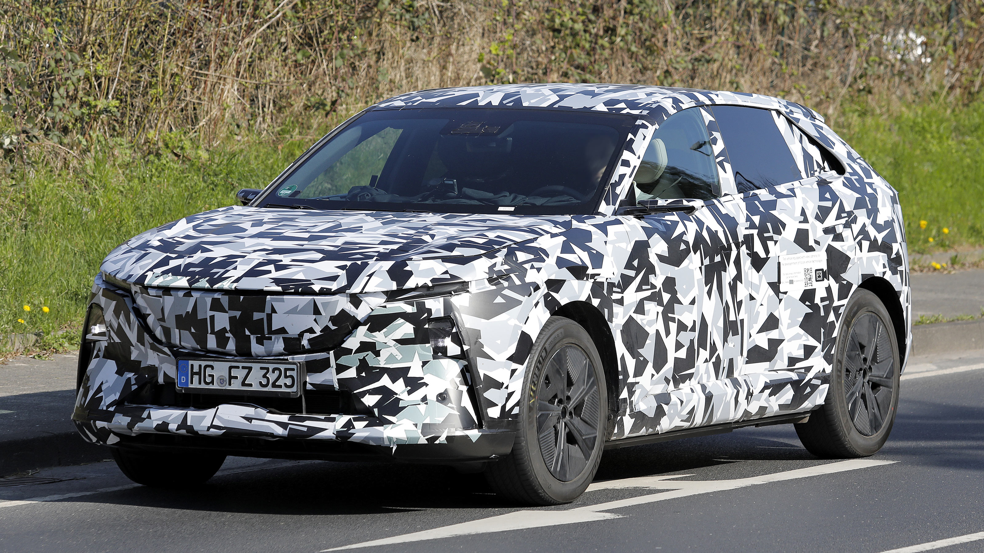 Mazda CX-6e spy shot front quarter