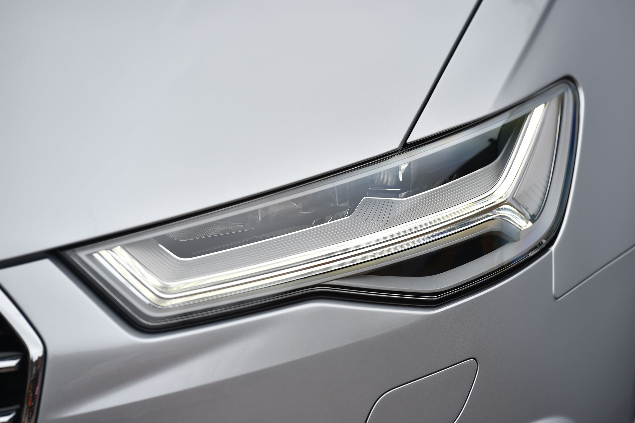 Audi's distinctive LED headlights give the A6 Avant a signature look