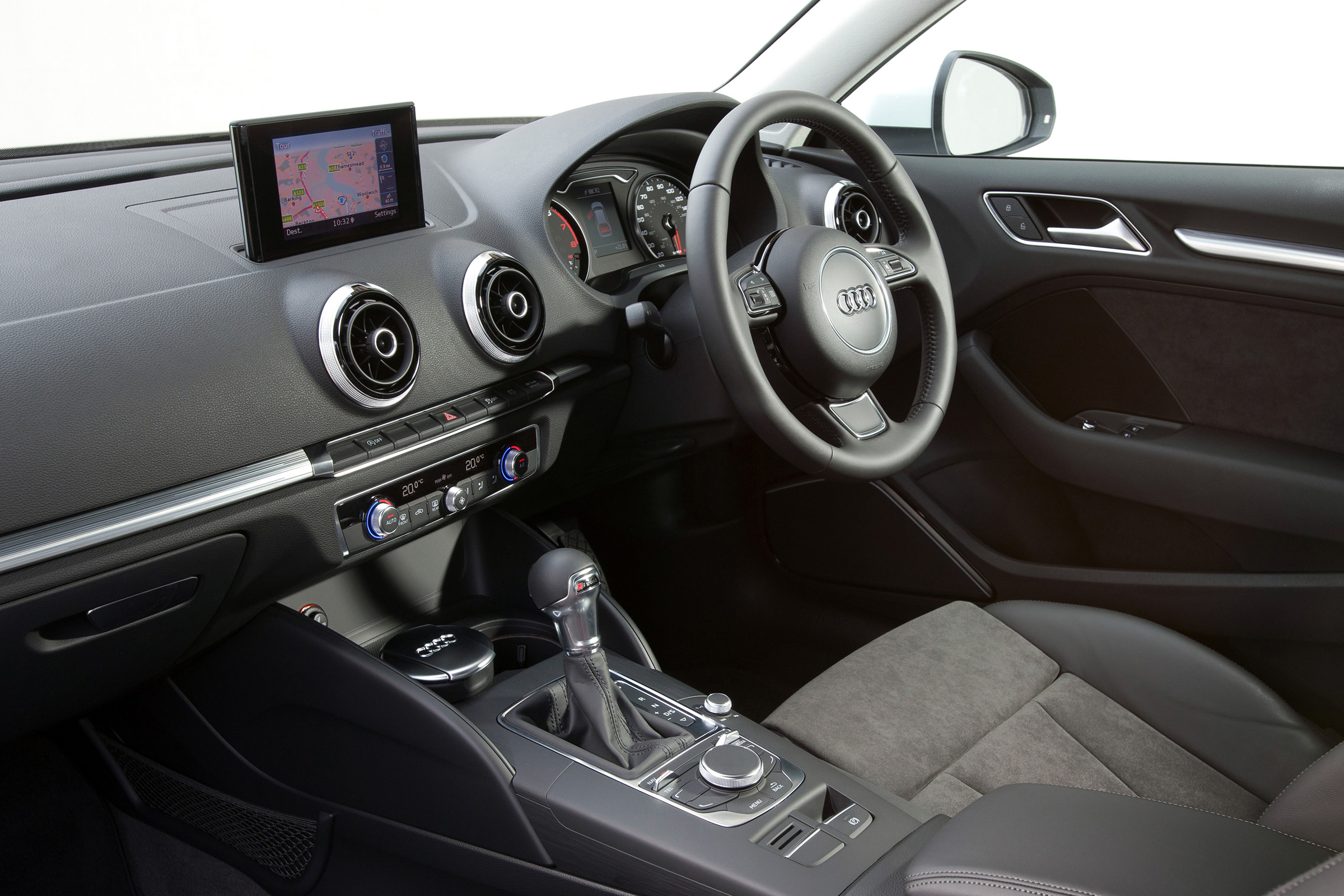 The dashboard has a minimalist 'wing-shaped' design and circular air vents