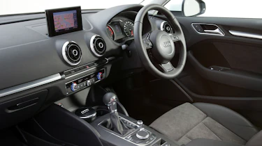 The dashboard has a minimalist 'wing-shaped' design and circular air vents
