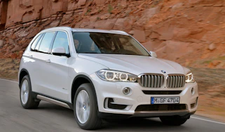 BMW X5 SUV 2013 front quarter tracking
