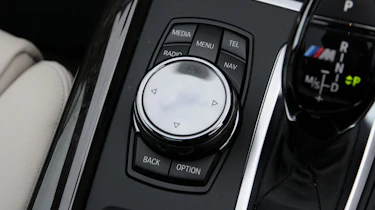 The iDrive controller is easier to use and safer than a touchscreen while driving