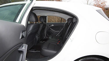 Headroom is a bit tight in the back, but adults will be fine for shorter trips