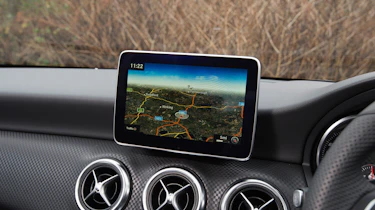 We're not fans of the 'perched' infotainment screen, but the controls are logically laid out