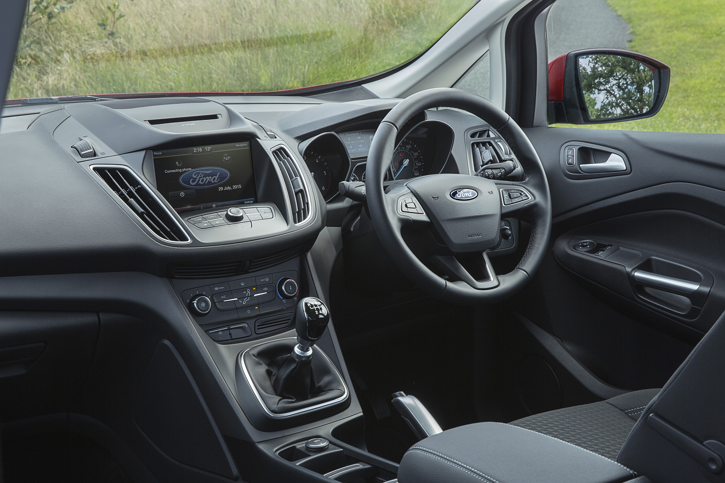 A large screen in the middle of the dash is powered by Ford's SYNC infotainment system
