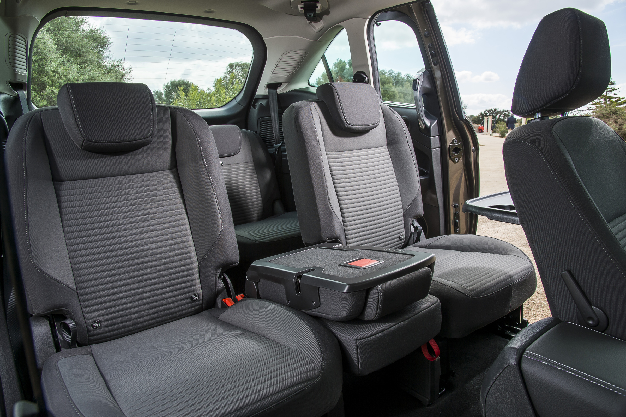 Lots of configurations are possible, with the middle seat even doubling as a picnic table when not occupied