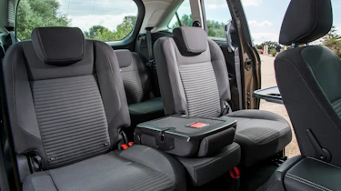 Lots of configurations are possible, with the middle seat even doubling as a picnic table when not occupied