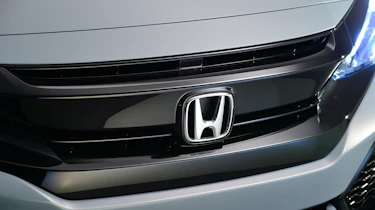 Honda's latest corporate face is evidenced by the new Honda Civic's nose treatment