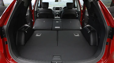 Fold the middle row down and luggage volume increases to 1,615 litres