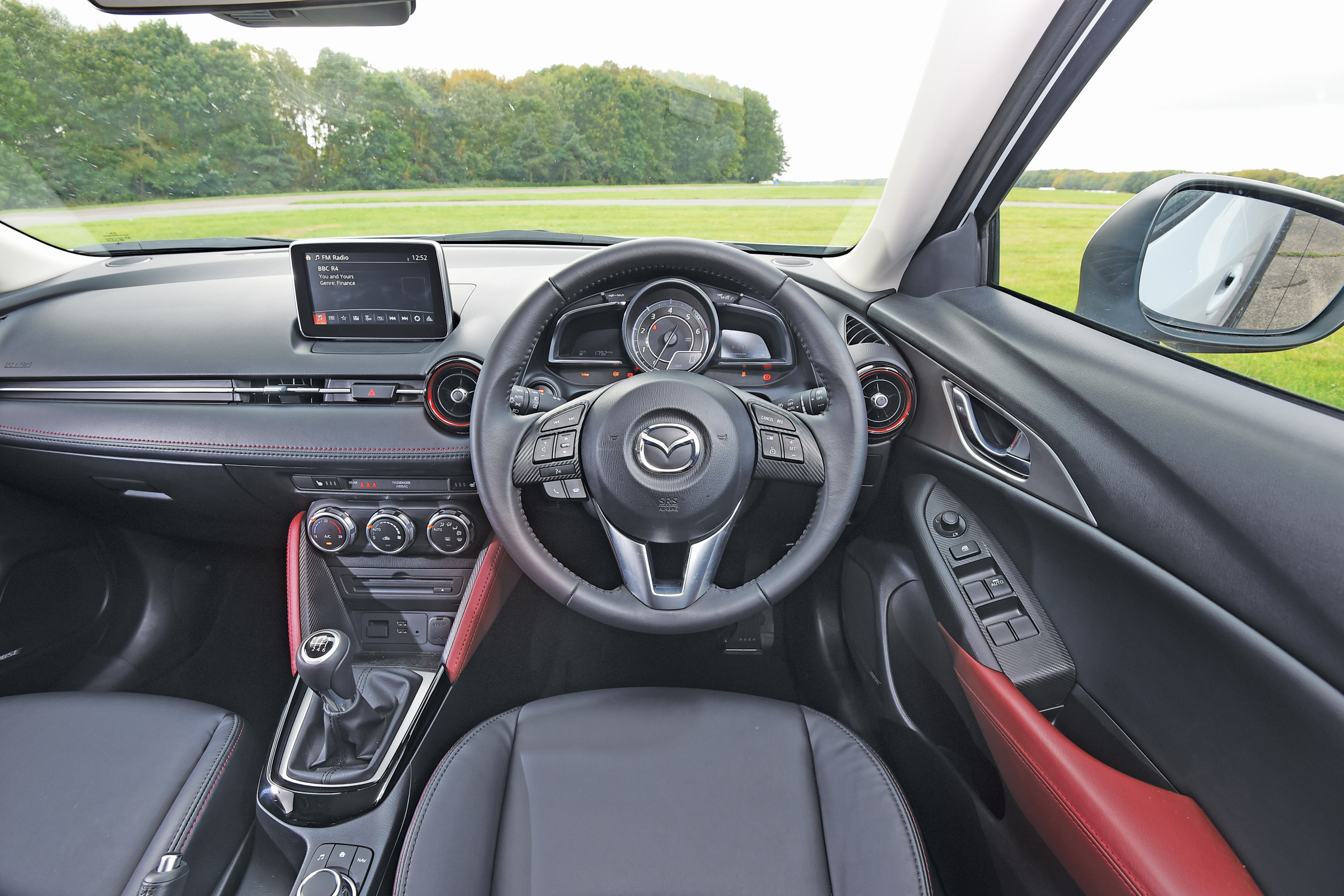 The dashboard has a sporty layout and puts you in the mood for driving fun.