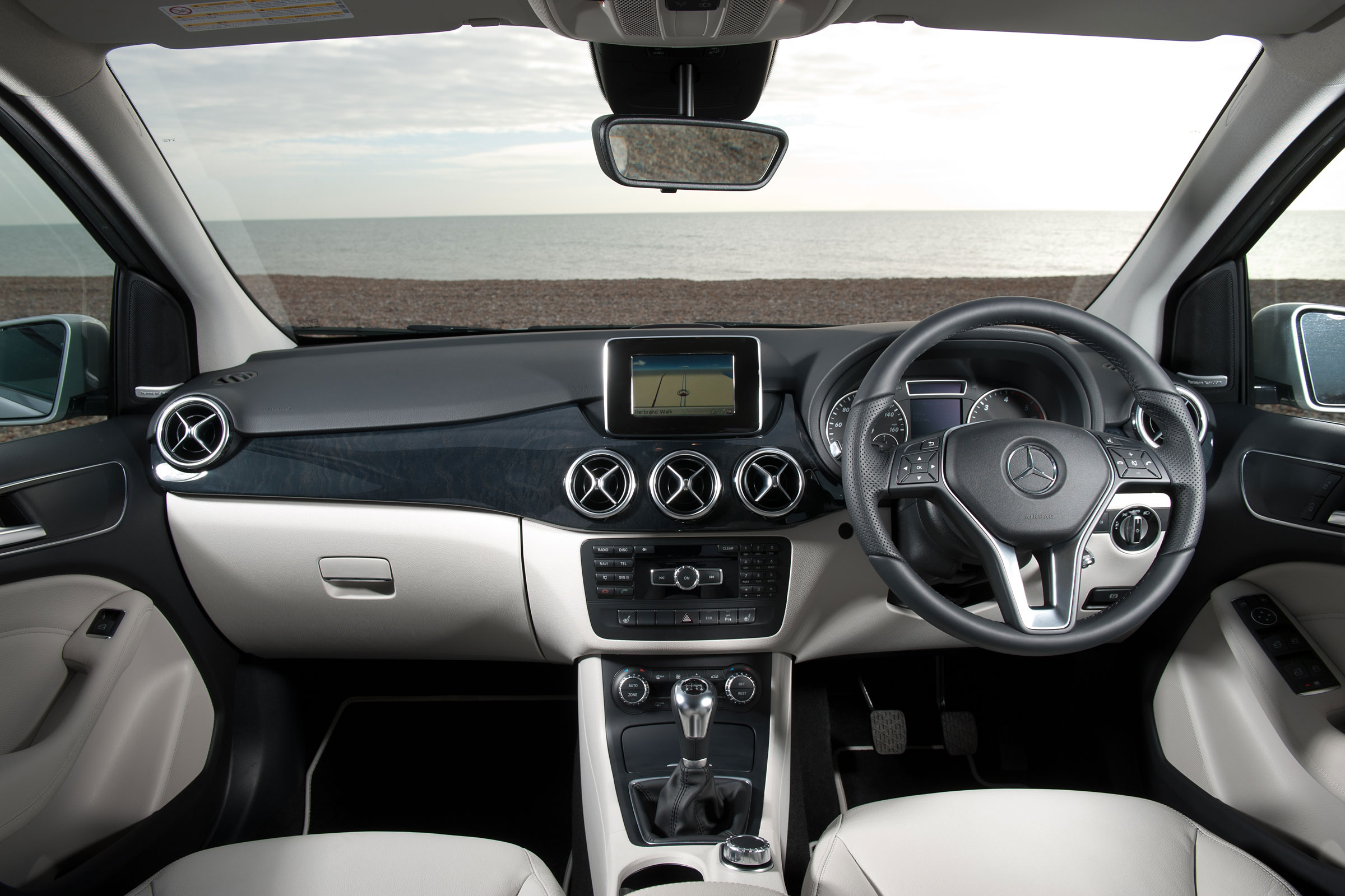 The B-Class has an upmarket dashboard for the class, even if the infotainment screen does look a little aftermarket