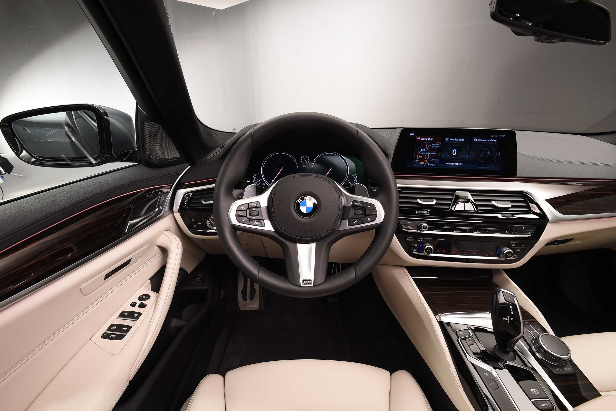 The BMW 5 Series' dashboard is a masterclass in high-quality executive luxury
