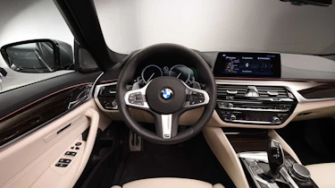 The BMW 5 Series' dashboard is a masterclass in high-quality executive luxury