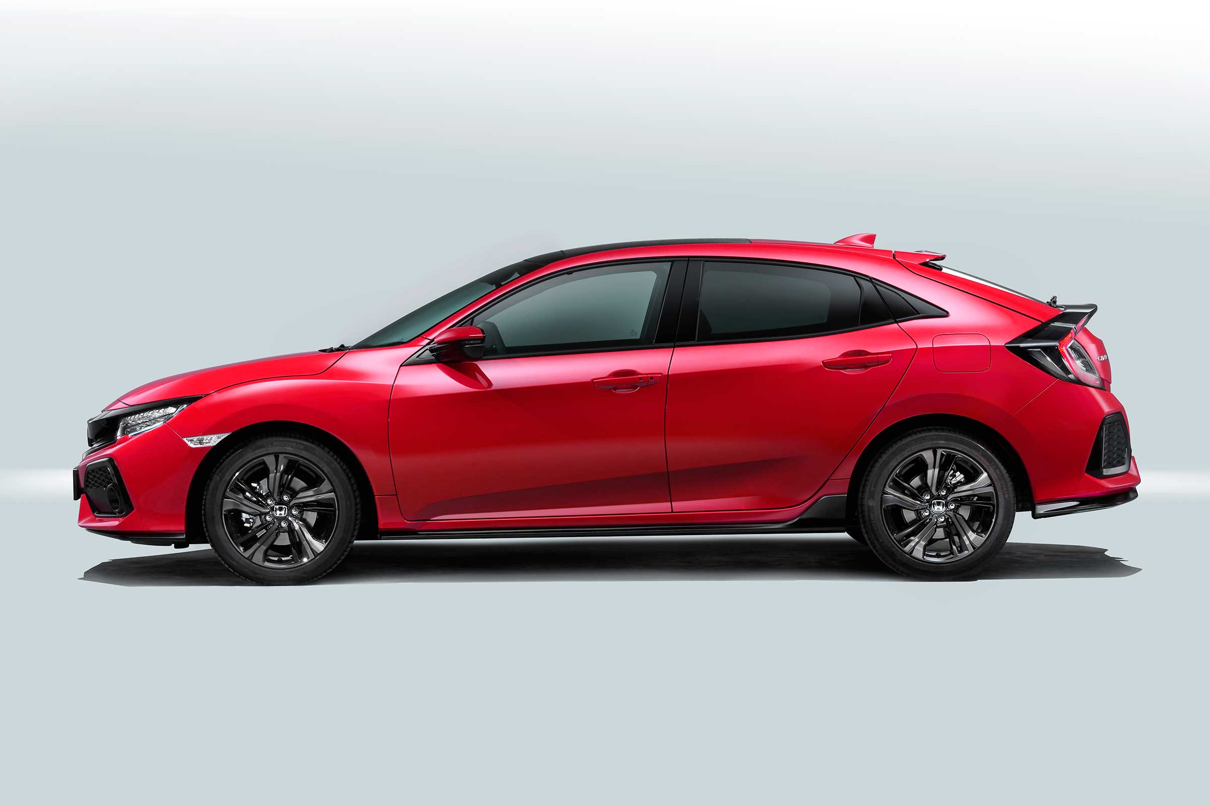 The five, readily visible doors of the Honda Civic hint at a greater degree of comfort inside