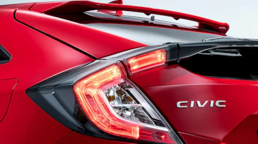 The rear lights of the new Honda Civic have a unique C-shaped light signature