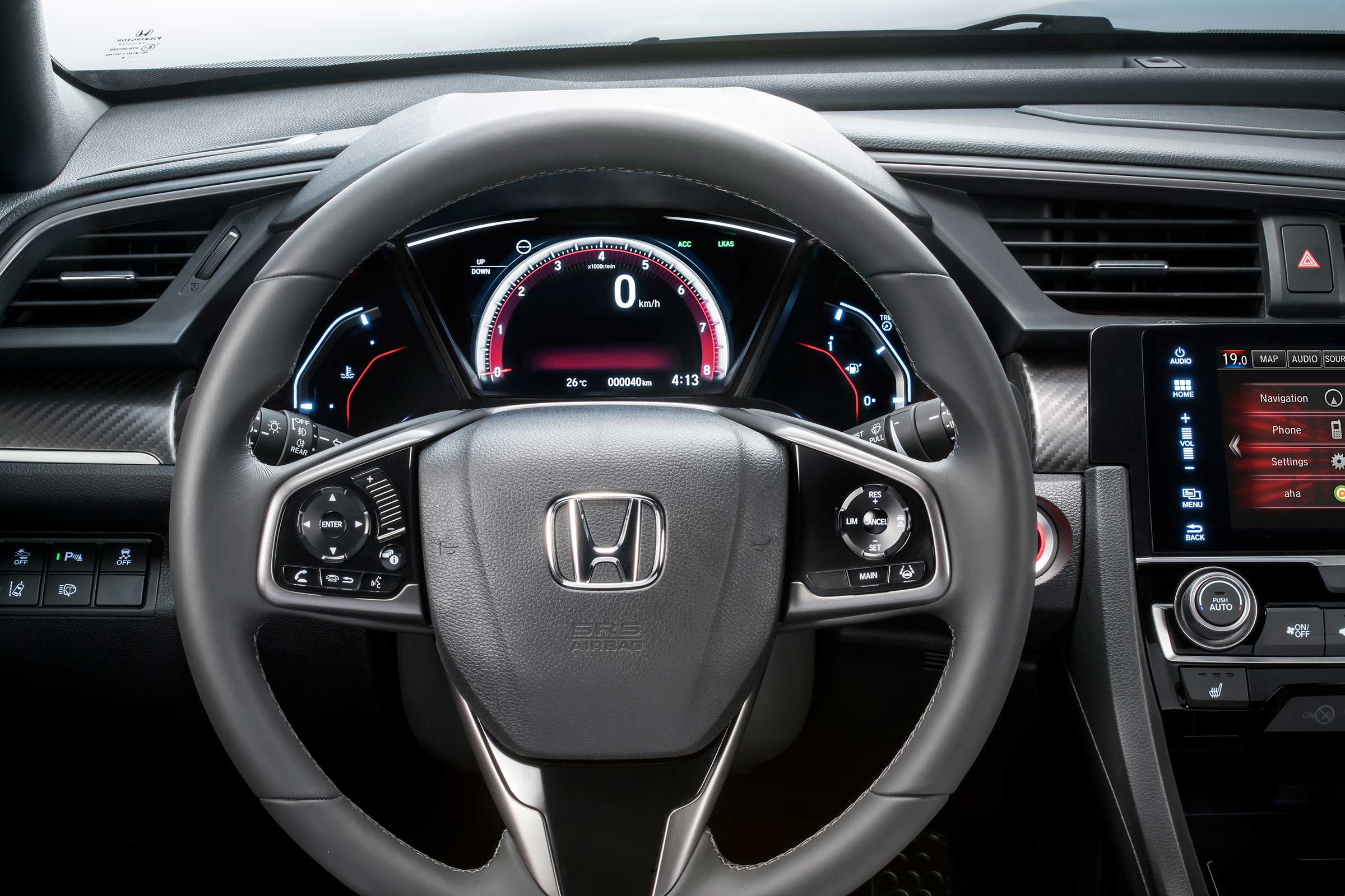 The new Honda Civic's instrument cluster is dominated by a central TFT screen
