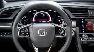 The new Honda Civic's instrument cluster is dominated by a central TFT screen