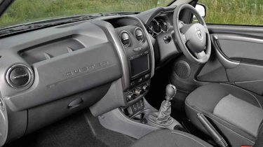 Scratchy plastics are the order of the day inside, though the Duster feels built to last