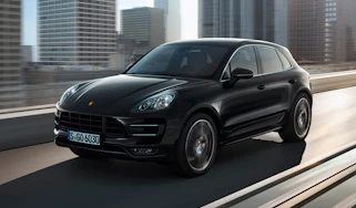 Porsche Macan SUV 2014 front quarter tracking