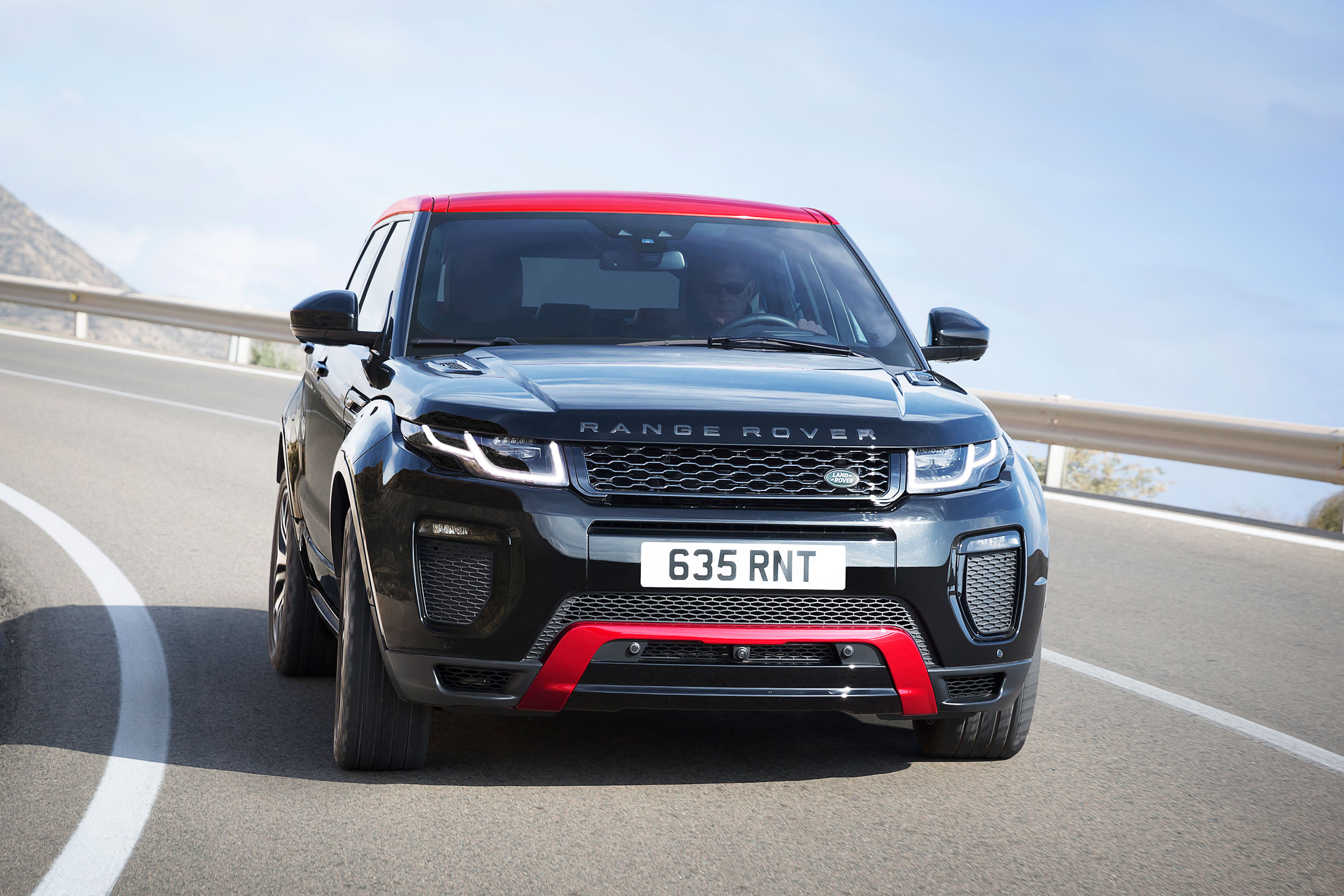 It has a Firenze Red roof and accents which contrast with Santorini Black paint for the bodywork
