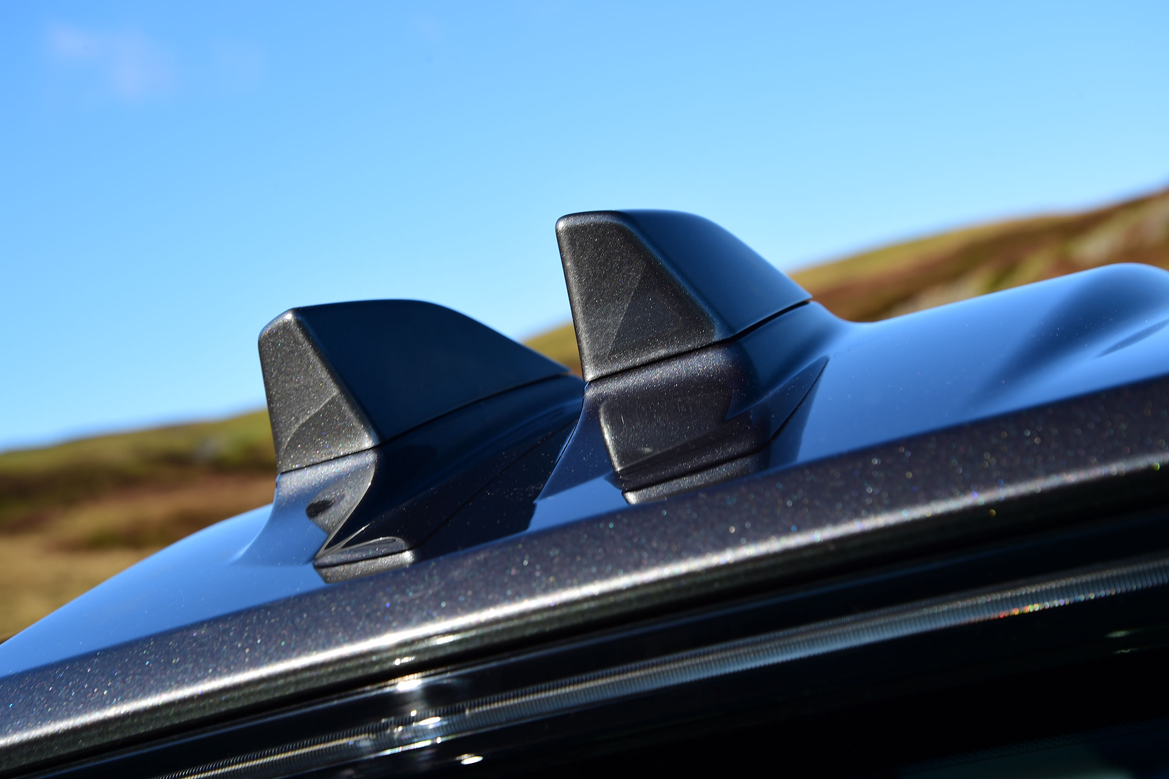 Distinctive dual shark fin antennas help mark the facelifted Evoque out from earlier examples