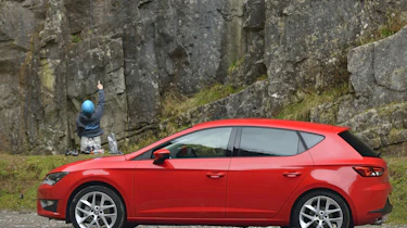 Side view of red SEAT Leon