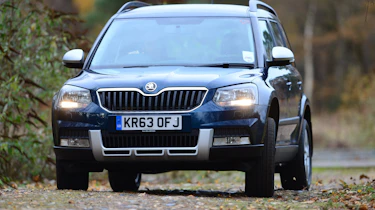 The Outdoor's additions include a prominent protection plate at the front of the car