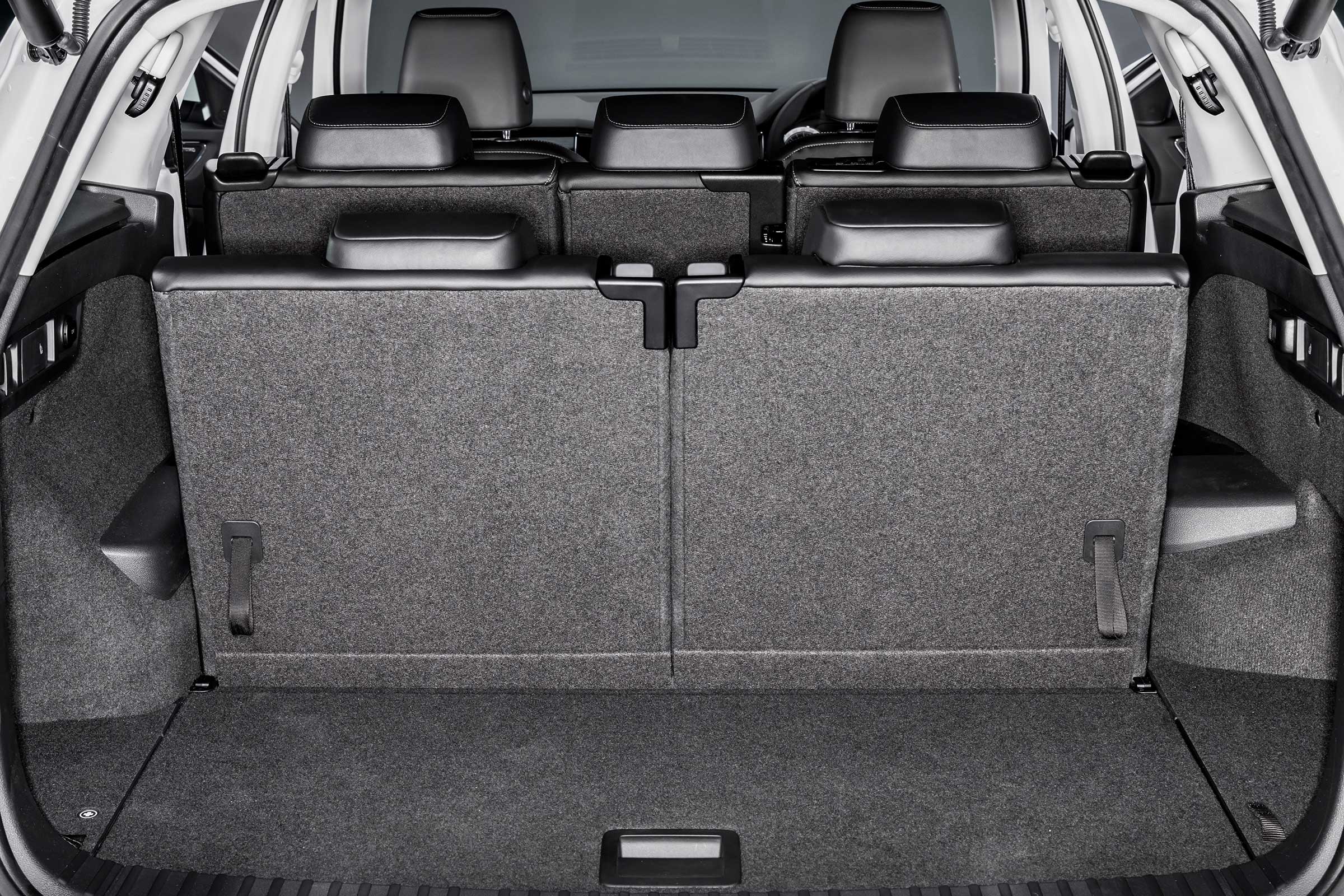 Even with all 7 seats in place, you get a decent amount of boot space