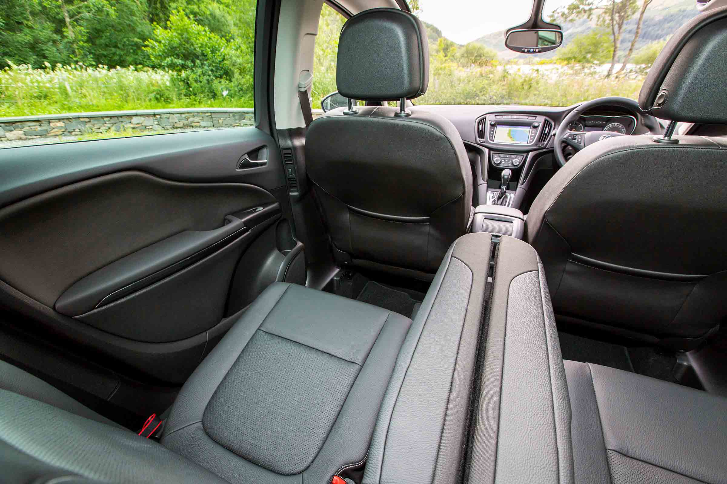 The second row is very comfortable with adults and can be adjusted to give more legroom