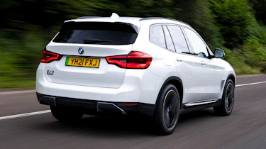 BMW iX3 SUV rear 3/4 tracking